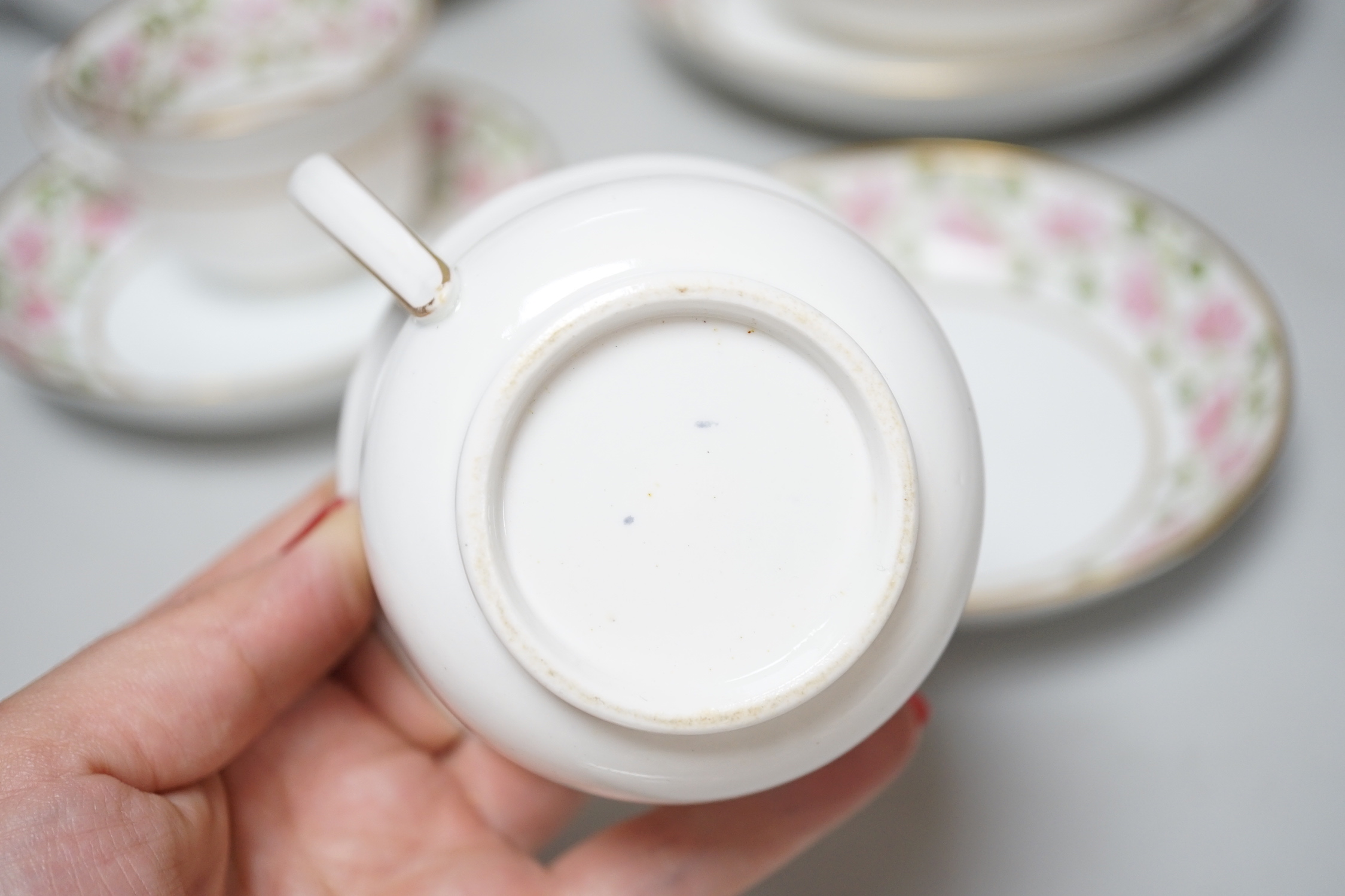 An early 19th century part tea service, teapot and cover, a sucrier and cover, two cups and saucers and a saucer-dish